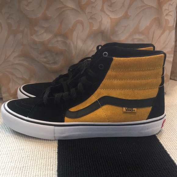 yellow and black vans high tops
